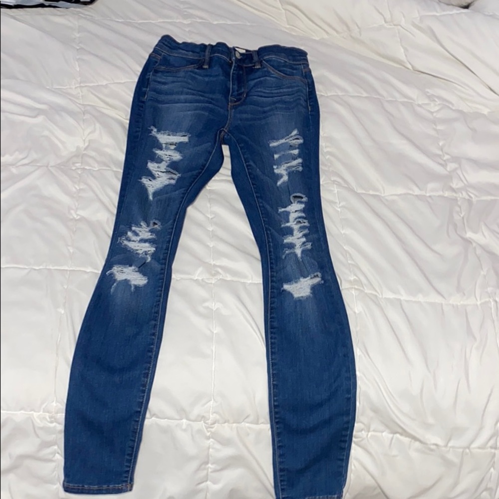 dark blue ripped jeans